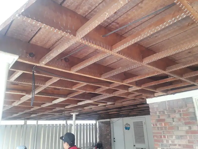 Open soffit with the underside of the joists exposed
