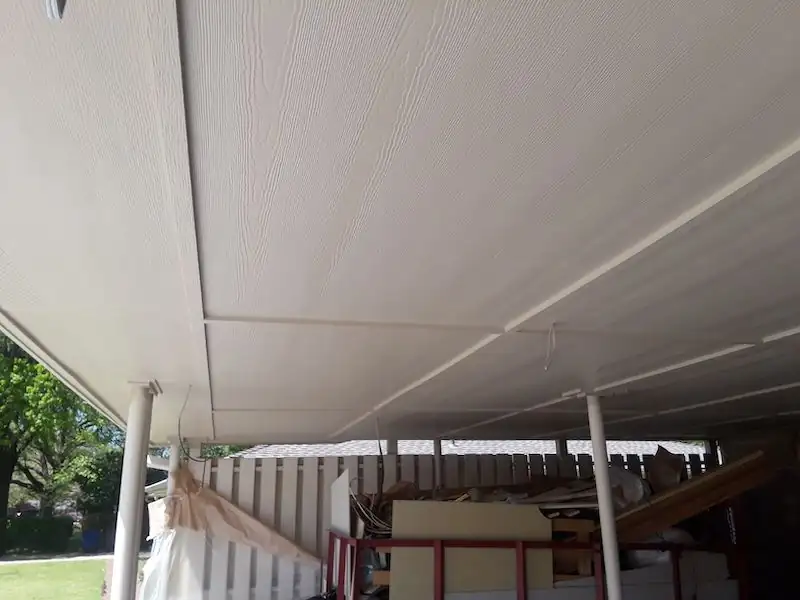 Finished soffit panels under a covered patio